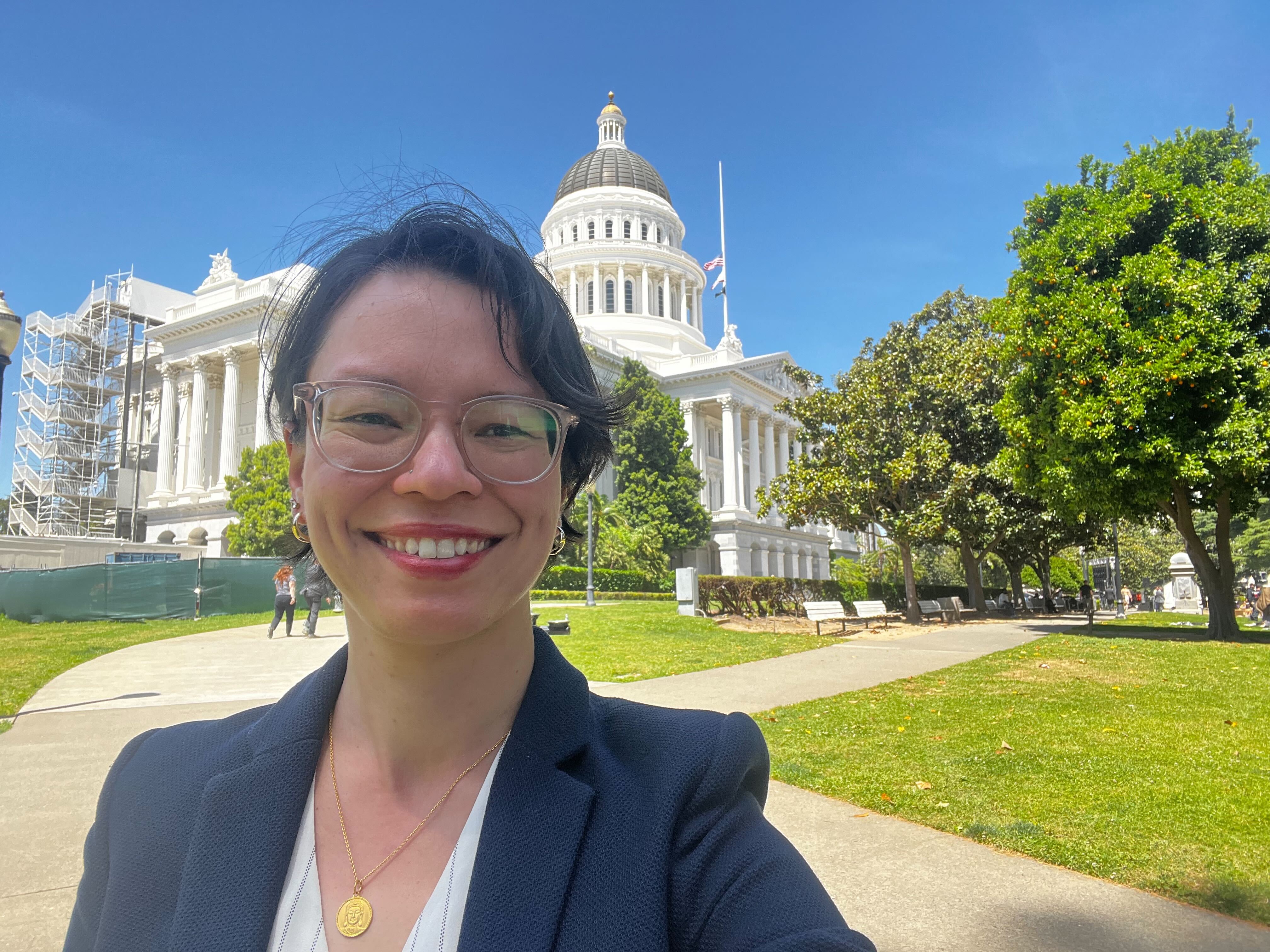 Free Press Action's Alisha Wang Saville outside the California statehouse